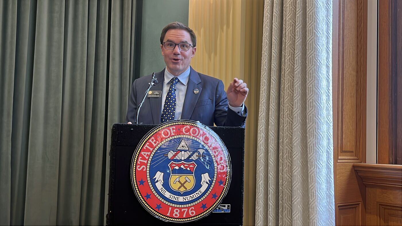 Rep. Chad Clifford speaking at a bill signing at the Colorado Capitol